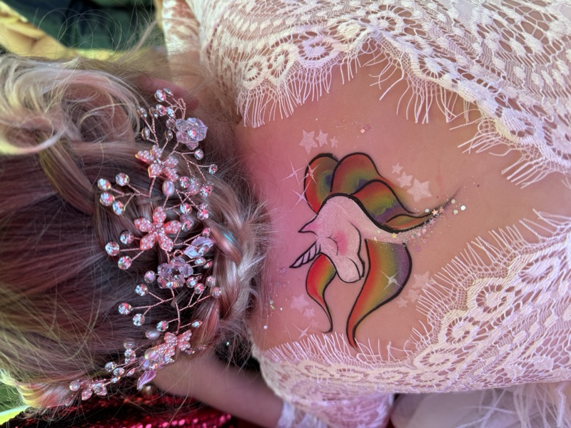 Rainbow Unicorn — body art with flowing rainbow mane